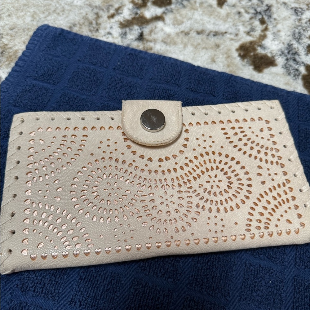 Cream Leather Wallet with Intricate Perforations